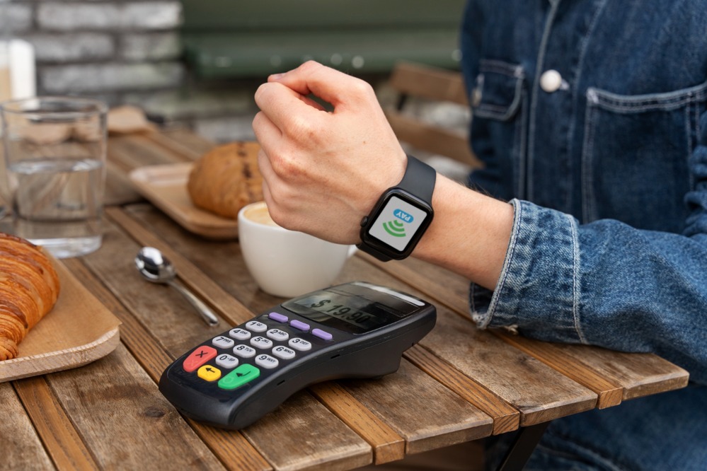 person-paying-using-nfc-technology.jpg