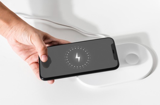 hand-connecting-smartphone-wireless-charger.jpg